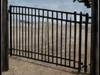 Custom fabricated steel driveway gate