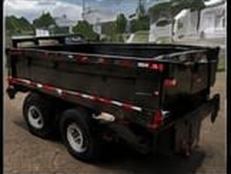 Repaired dump trailer with new steel sides