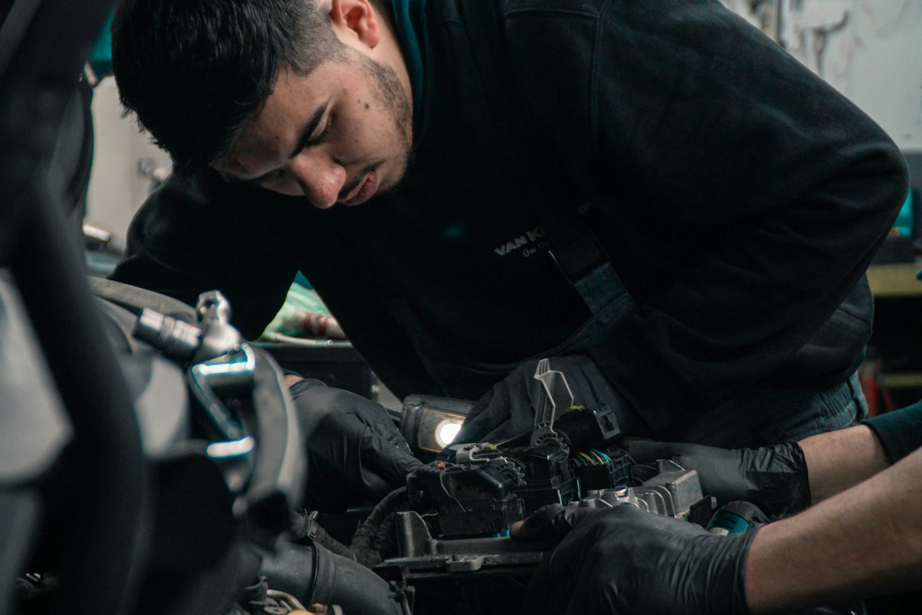 Technician carrying out maintenance work on machinery